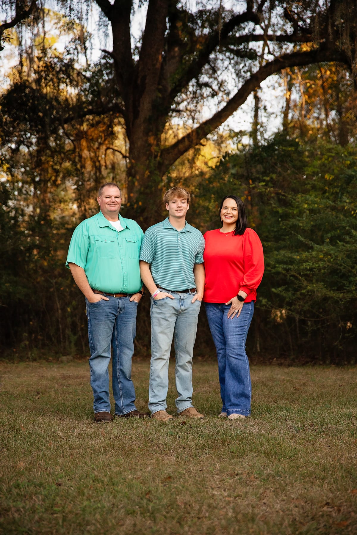 Melissa with her family under a live oak draped in Spanish moss